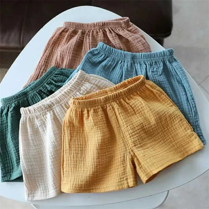 Shorts Baby Cotton Linen Summer New Childrens pantaloni a cinque punti Ragazze sottili abbigliamento da ragazzo corto traspirante H240423