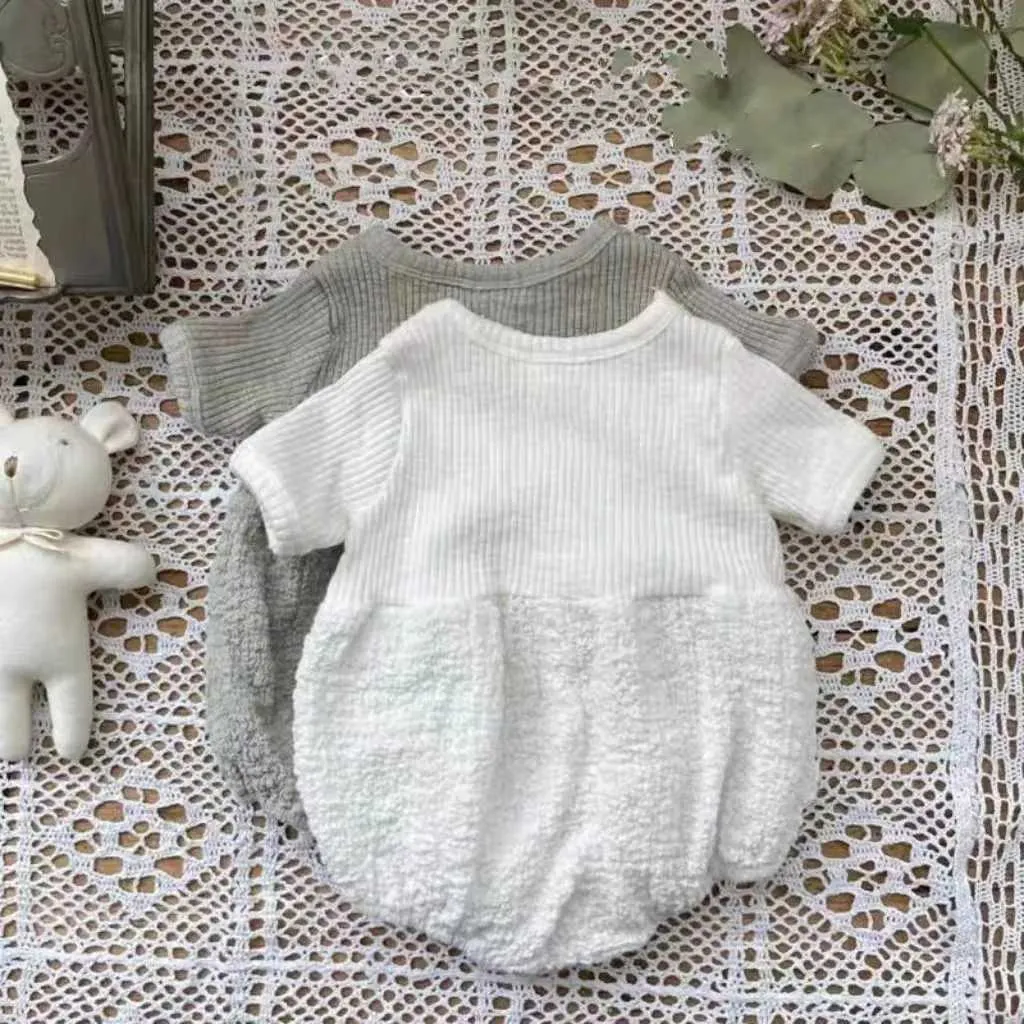 Rompers 2023 Summer New Baby Solid Short Sleeve Bodysuit Infant Girl Cute Puff Jumpsuit Newborn Toddler Cotton Ribbed Clothes 0-24M H240423