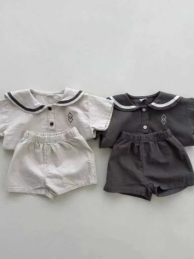 Ensembles de vêtements 2024 NOUVEAU bébé à manches courtes Baby Set Vêtements Toddler Boy Girl Girl Navy Collier + Shorts 2PCS SUIT