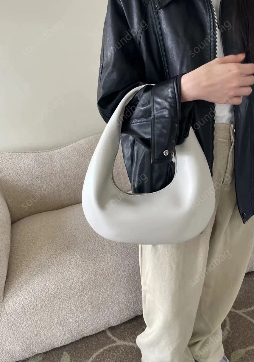 2024 Spring Khaite Crescent Moon Bag: Luxe echte lederen knoedel Tote - Designer Fashion voor vrouwen, minimalistische textureerde lederen handtas zwart