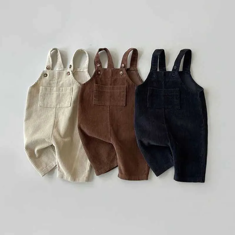 Jumpsuits 2023 Nieuwe baby mouwloze corduroy overalls solide pasgeboren katoen romper kinderen casual riem jumpsuit herfst baby baby kleding H240423