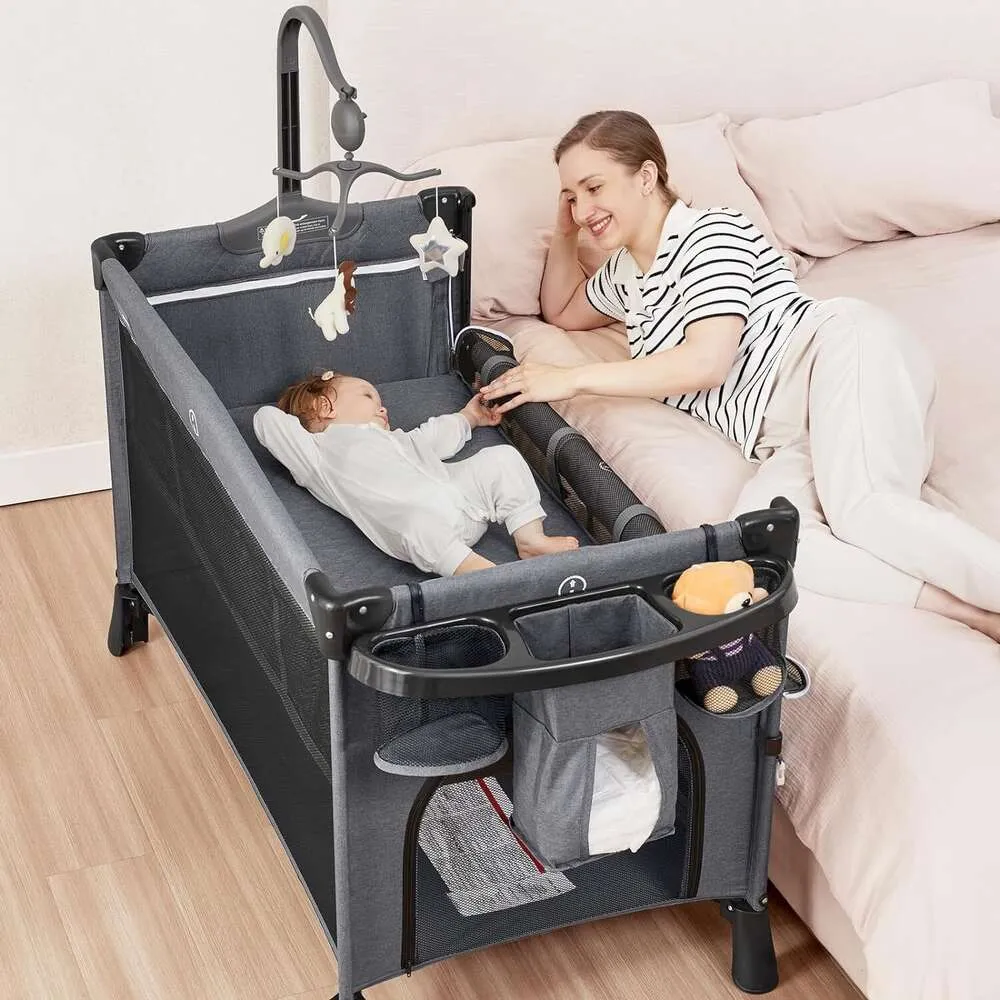 Angelbliss 5 in 1 Baby Bassinet Martide Crib Playpen Pack и играйте в Bassinet с подразделением подгузника и съемным рокером.