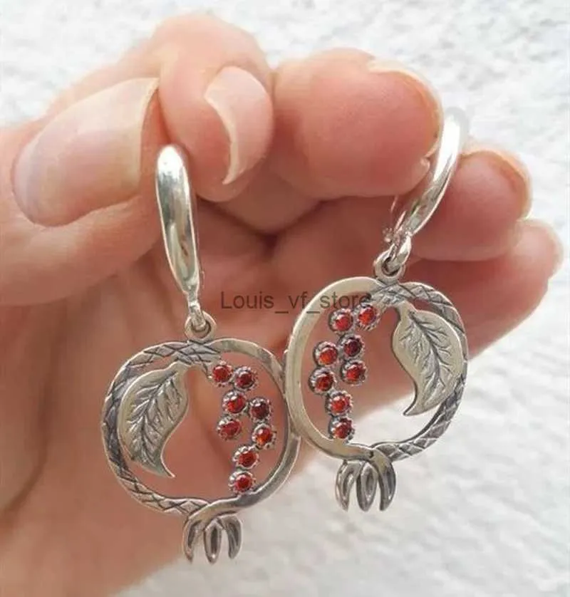 Boucles d'oreilles exquises de lustre en lustre