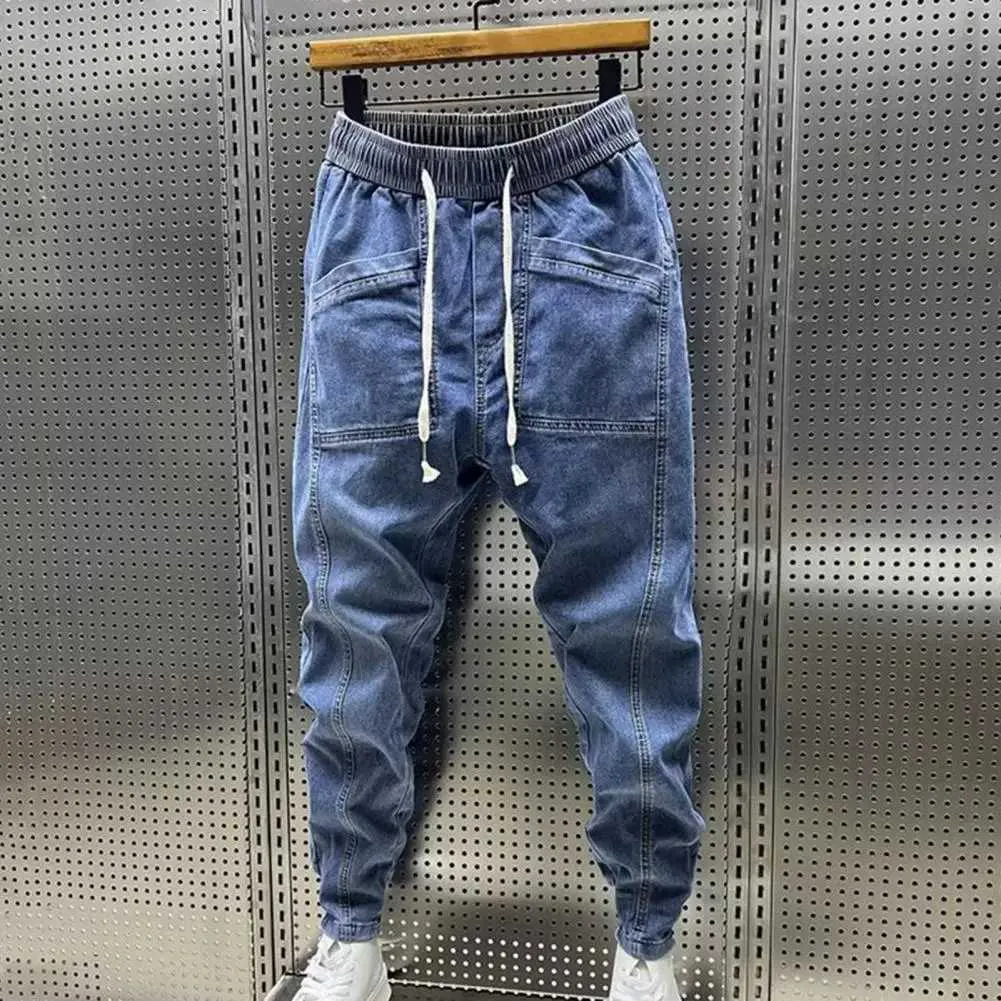 Mężczyzn męski Męskie Elastyczne sznurkodruk dżinsowe spodni z kieszeniami Spring Autumn Harem Spodni stały kolor dżinsy 240423