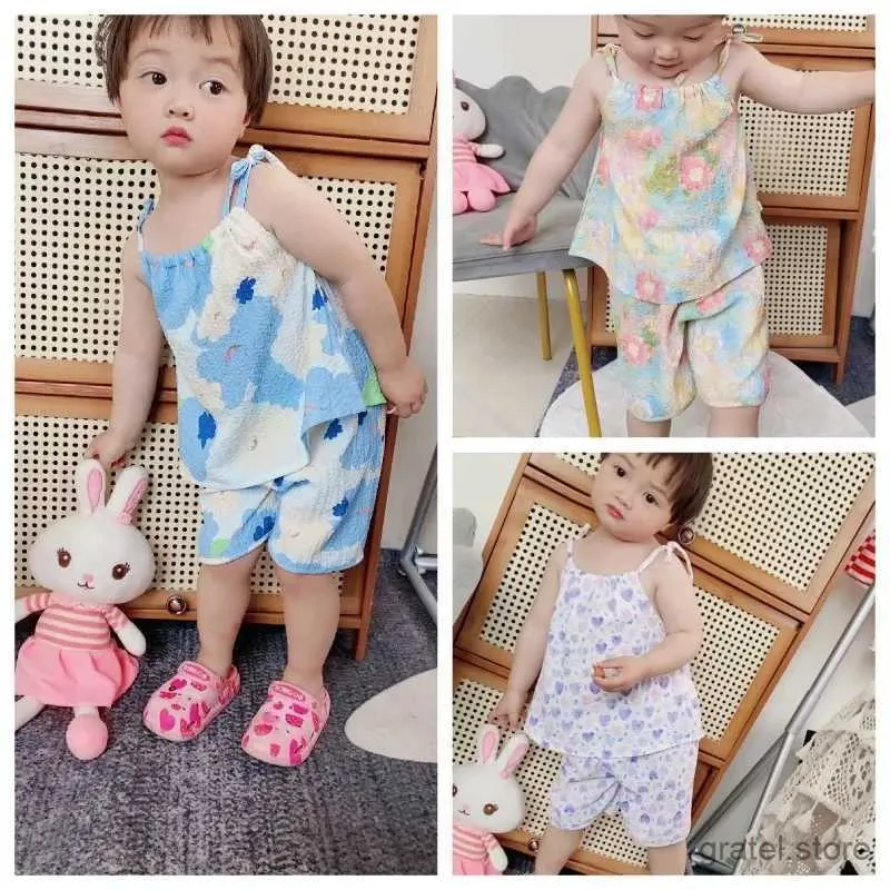 Juegos de ropa 2pc set para niña para niños ropa nueva niña de niñera set de verano delgados niños sueltos camisole + pantalones cortos traje de niñas trajes de niñas