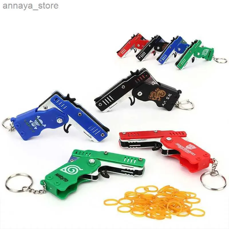 Pistolets pistolet 1pc mini jouet pistolet keychain 50 bandoulins pliants pliant pistolet tir de tir pistole