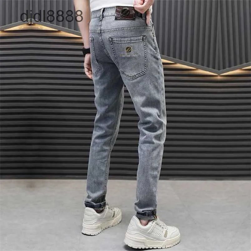Jeans di fascia alta da uomo alla moda di marca alla moda in forma spostata a molla di alta gamma pantaloni estivi in stile estate
