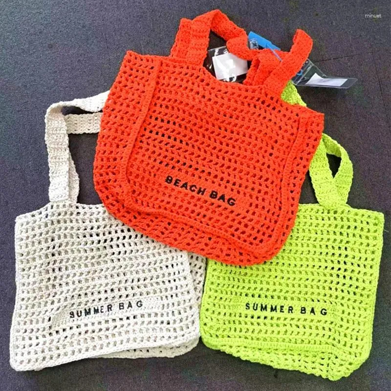 Axelväskor handgjorda stickningar tygväska ihålig virkning kvinnor designer handväskor sommarvävda strand för mjuk shoppare