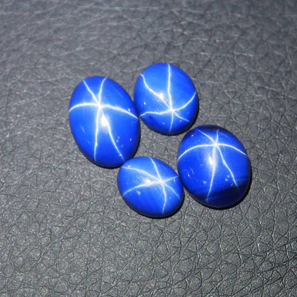 Gemstones 7.5 carats blue star sapphire 10*14 mm 2 Piece/a lot Oval Flatback Cabochon gemstone blue Star Ruby sapphire for ring making