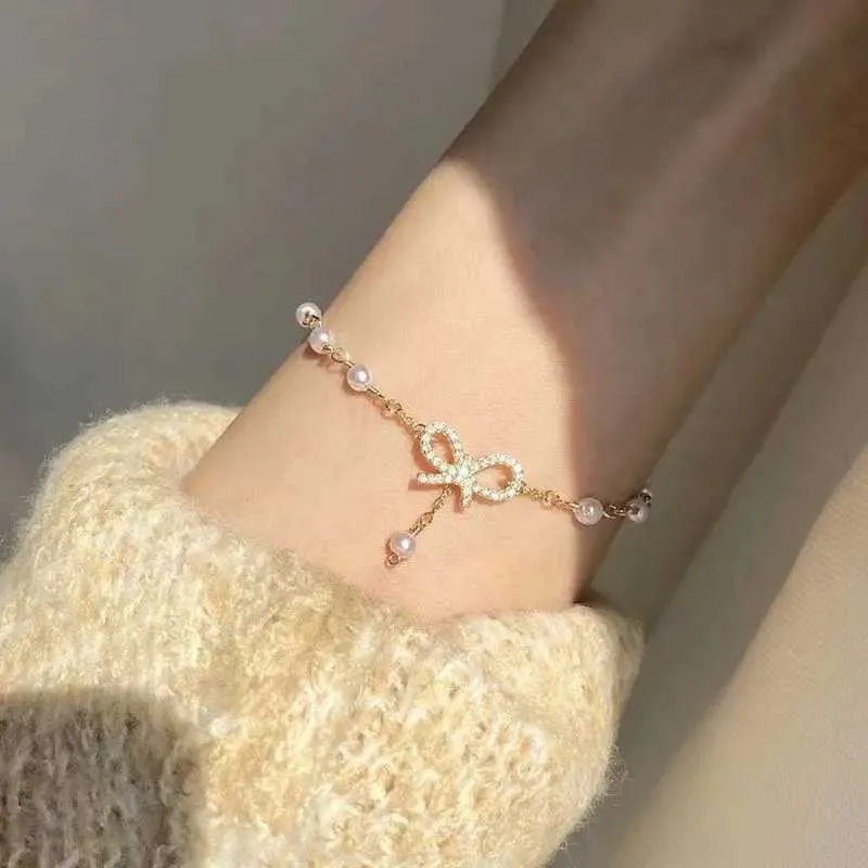 Perlen süße koreanische Nachahmung Perlenverbindungskette Armband für Frauen Mädchen eleganter Charme Crystal Bowknot Bogenschmuck Frauen Party Geschenke 240423