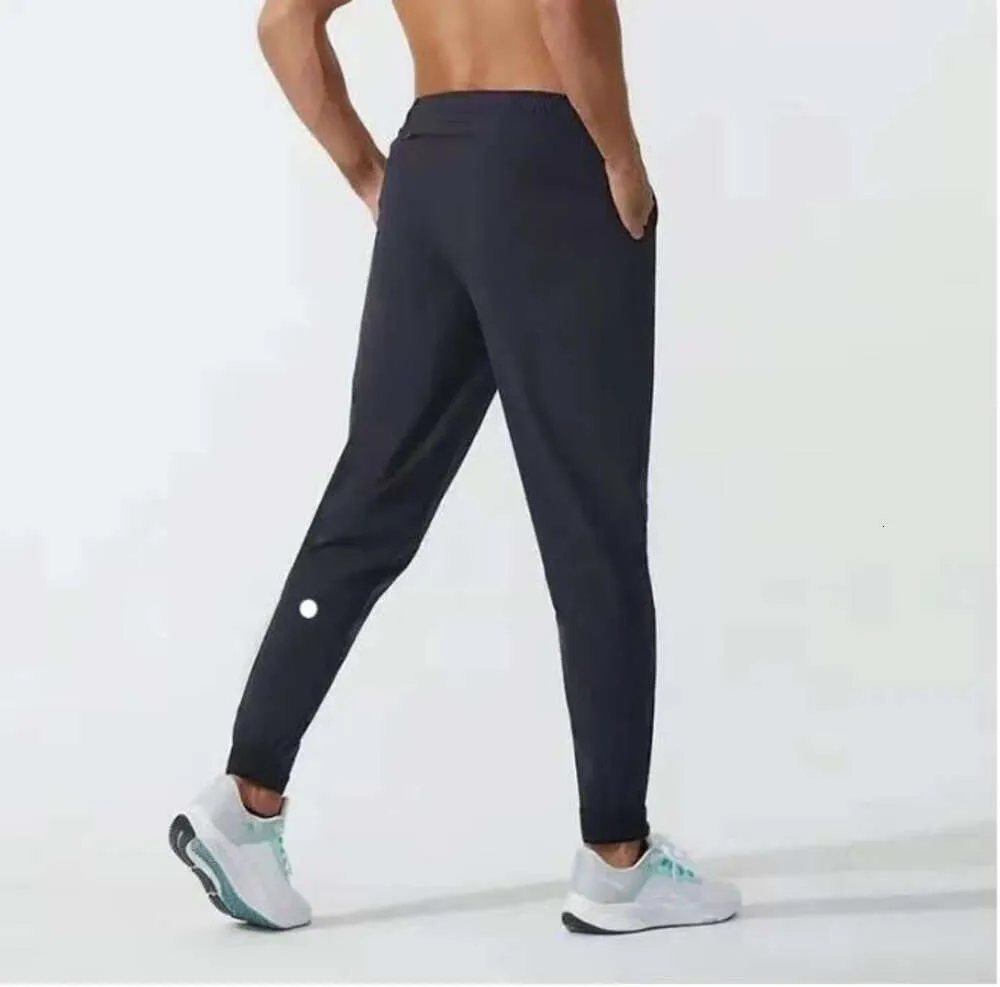 Ll erkekler jogger uzun pantolon spor yoga kıyafeti hızlı kuru çizim spor salonu cepleri eşofmanlar pantolonlar erkek gündelik elastik bel fitness tasarımcısı moda giyim 384665