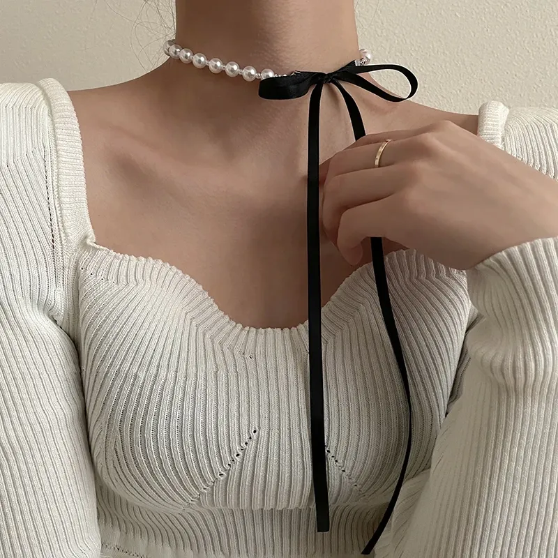 Naszyjniki Aomu Korea Słodki czarny aksamitowy łuk podwójny naszyjnik prosty bowknot Plush Pearl Clavicle Cllar for For Women Lady Biżuteria