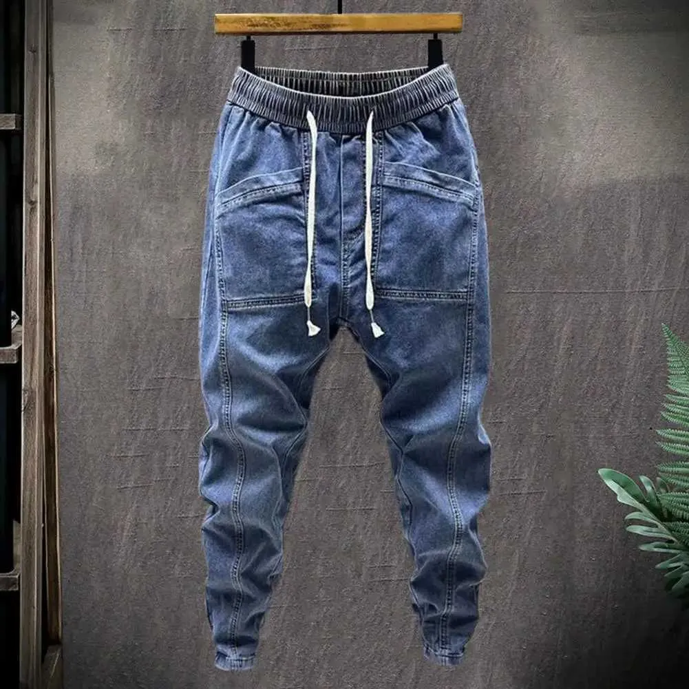 Heren jeans elastische taille jeans heren elastische trekkoord taille denim vrachtbroek met zakken vaste kleur harembroek voor lente herfst 240423