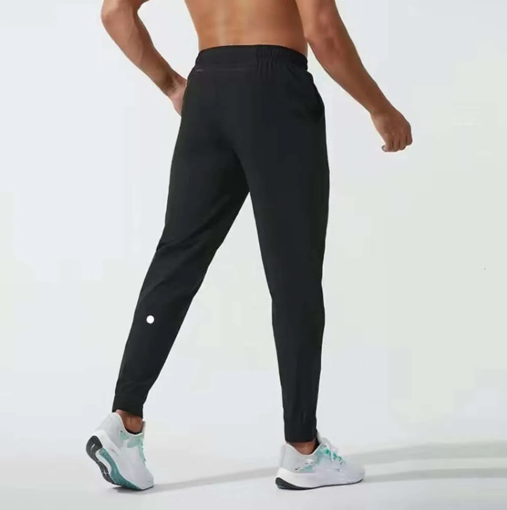 LL Men's Jogger Pants Long Sport Yoga Roupet Roupa de ginástica de ginástica de ginástica rápida calça de moletom calça de calça de fitness de cintura elástica casual da cintura 43255