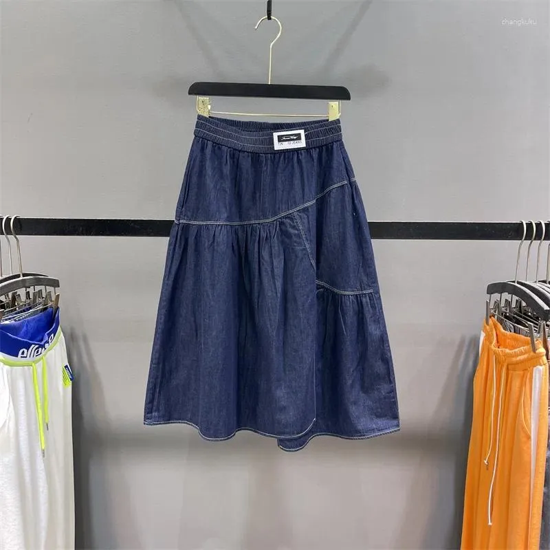 Röcke Deep Blue Jeansrock für Frauen im Sommer dünne elastische Taille Unregelmäßige Nähte großer Saum a-line mittlere Länge
