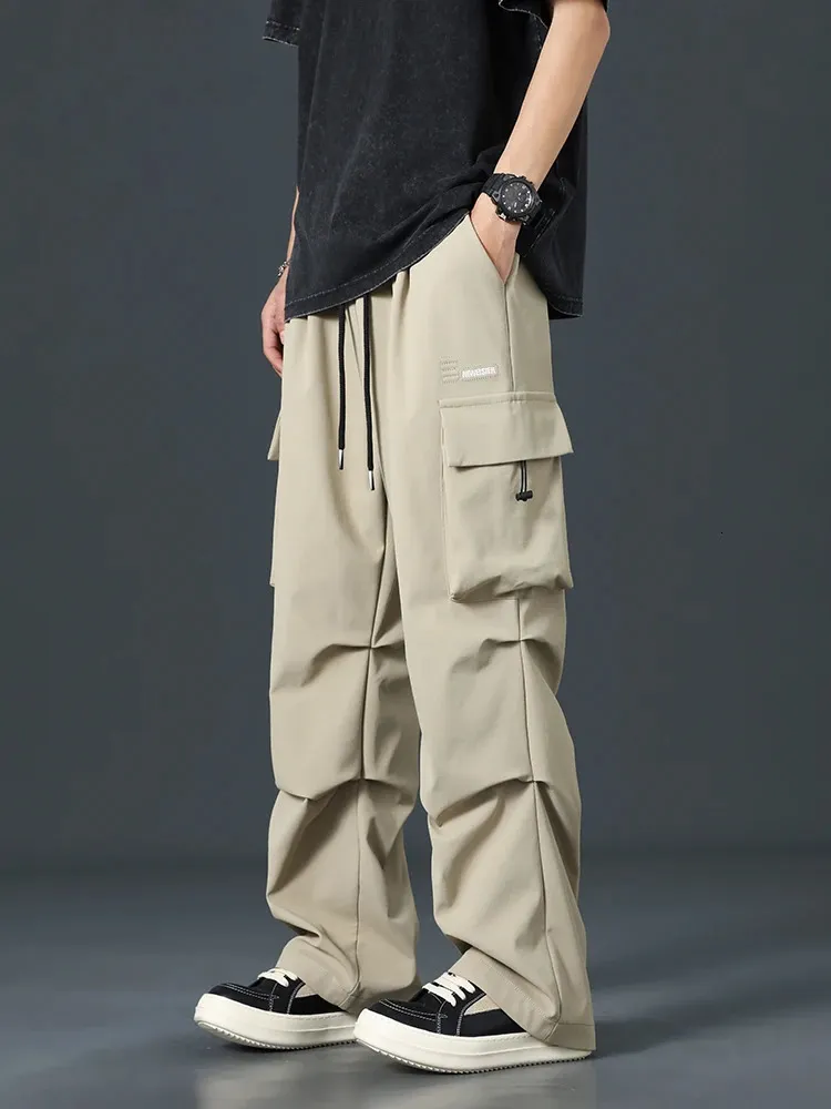 Pantalones de carga de verano hombres streetwear múltiples pockets ancho de pierna ancho pantalones rectos sueltos de talla grande 8xl 240409