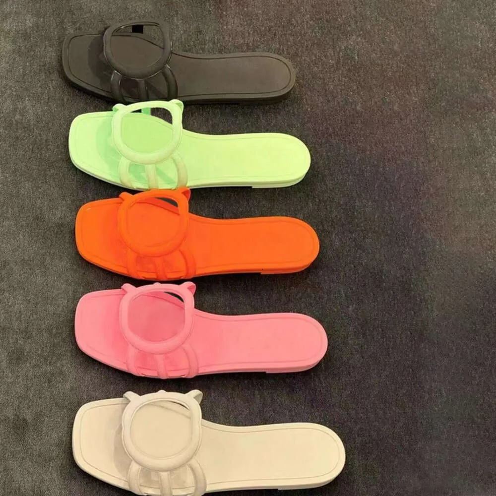 Sommerdesigner Sandalen Damen ineinandergreifende Folien Gummi -Hausschuhe Strand flache Schuhe mit Schachtel 560