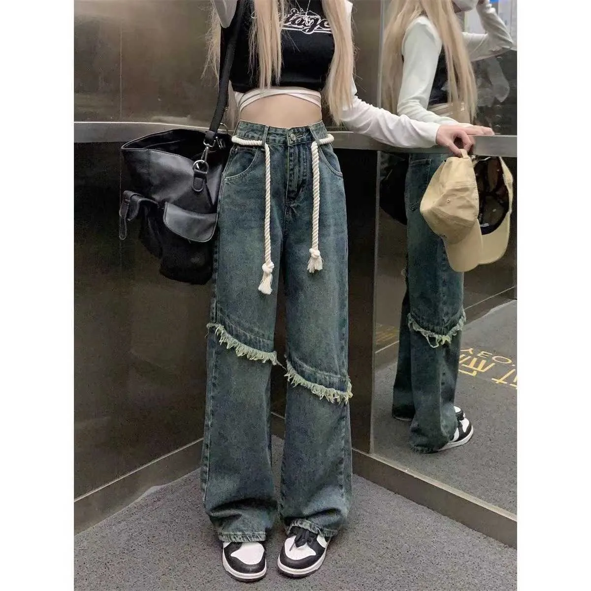 Amerikansk stil rufflade denimbyxor för kvinnor på våren och sommaren. Instagram High Street Straight Ben Slimming and Loose Ben Wide Leg Mop Pants Trend