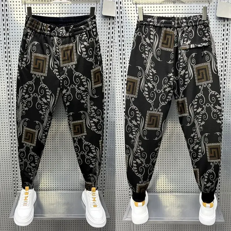 Spodnie moda ulica Hiphop Floral Pants luz luz haremowe spodnie najnowsze wysokiej jakości luksusowa marka odzież męska