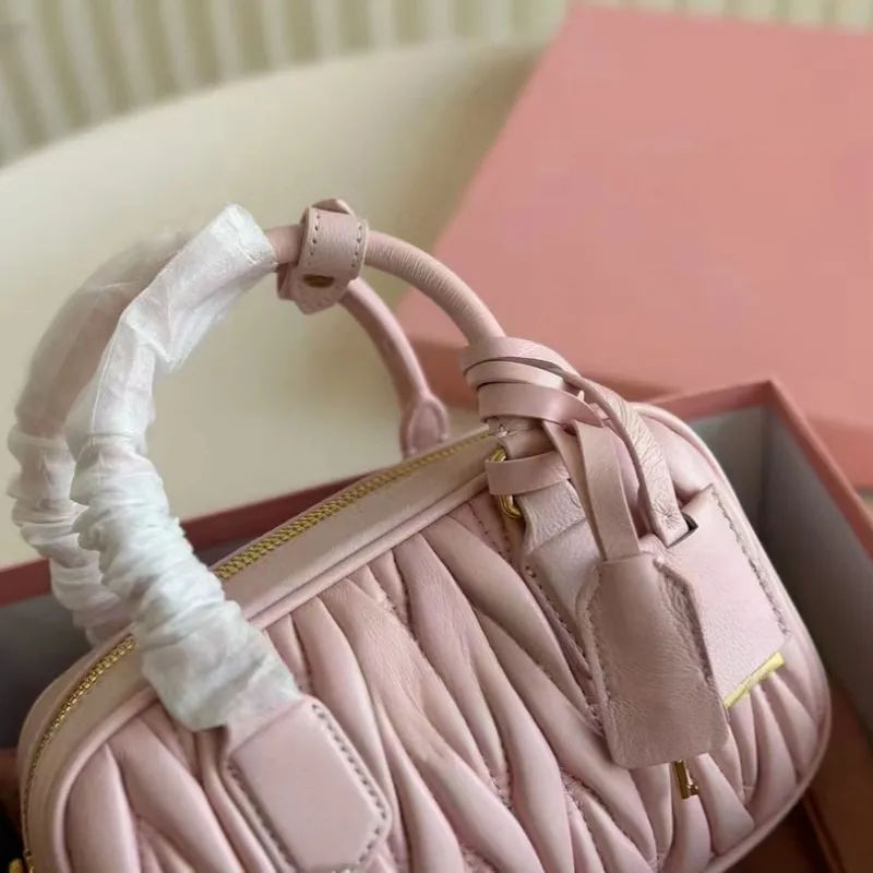Designer luxury cowhide totes Bag luxurys mesenger bag womens totes Classic pink pleated bowling handbag single shoulder bag crossbody bag size 20*12CM with box