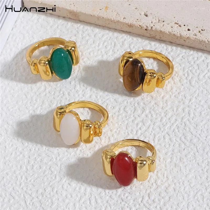 Anillos de racimo huanzhi 2024 vintage piedra ovalada encanto coro dorado color geométrico joyería para mujeres