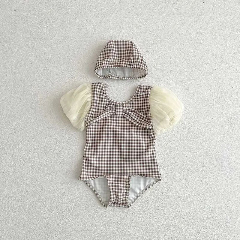 One-Pieces zomer nieuwe meisjes zwemkleding geruit mager strand één stuk kanten mouw baby zwempak H240425