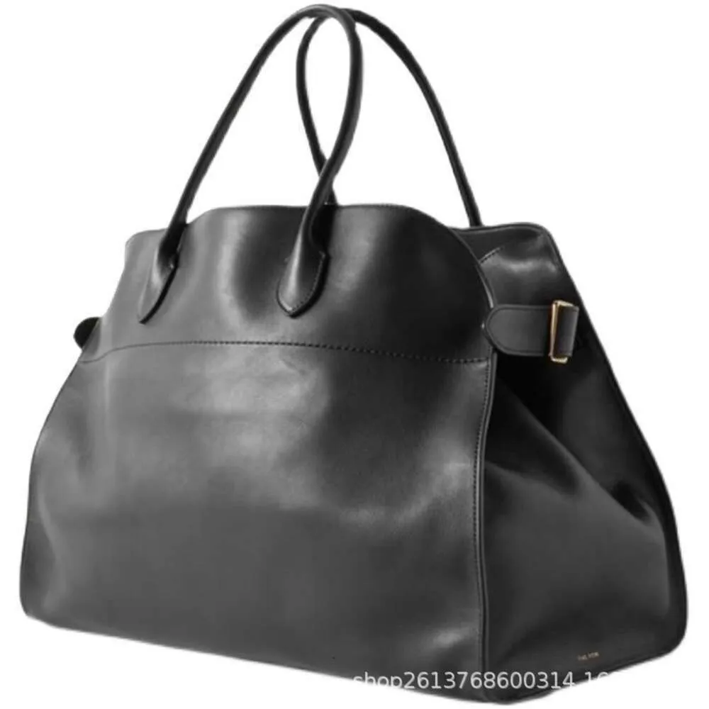 【送料&関税込】Off-White Hand Bag In Black Leather Off-White Zip Tie Leather Clutch Bag | Black | FARFETCH
