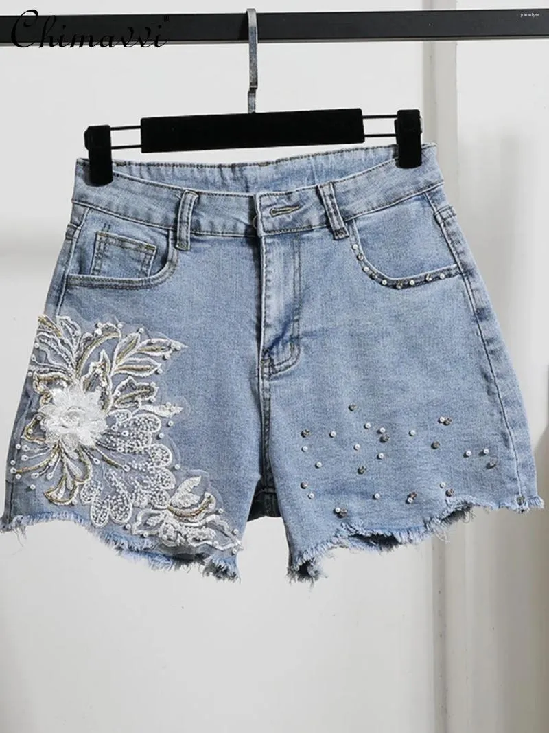 Shorts femininos 2024 Bordado pesado de moda de cor leve de cor de verão usada com cintura alta temperamento de fitd girl de jeans de perna larga