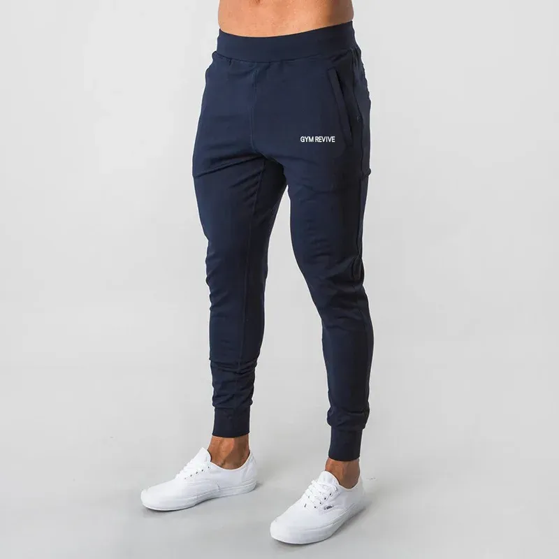 Calça de moletom 2023 nova fitness muscular que executa o treinamento esportivo de algodão calças de algodão masculino de feixe de feixe fino calças de saúde casuais