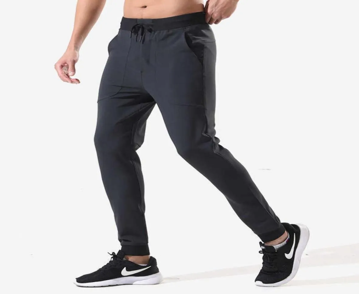 Men039S JOGGING YOGA Outfits Sports Casual Pants Running Fitness Gym Clothes Men Tights Loose Multi Pocket Zipper Elastic Worko4883964