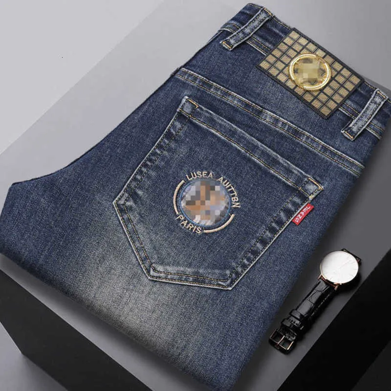 Designer de jeans masculin automne / hiver de marque à la mode pour hommes élastiques slim slim small-tube légère luxe de luxe.