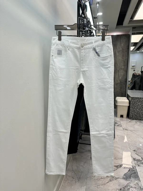 2024 Spring Autunno ricamo stampata stampa cerniera jeans maschili pantaloni a matita per uomo lavati con luce sbiancata WCNZ110