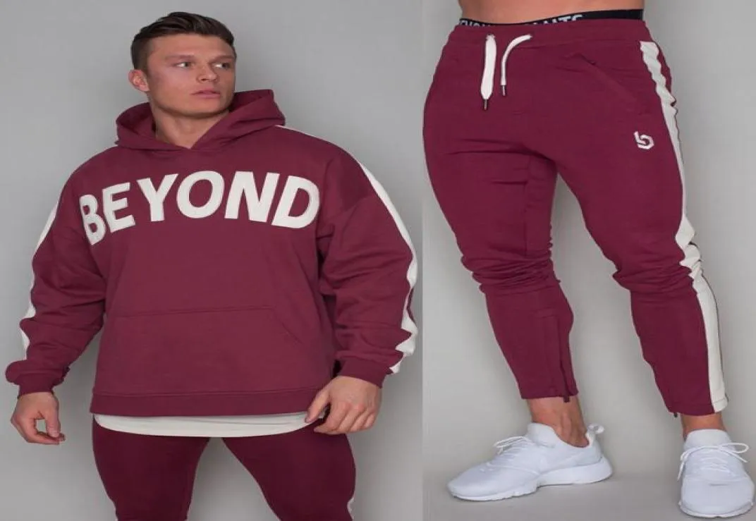 Nya sportkläder set män som kör sport tröja tröja tröjor gym fitness hoodie byxor passar manlig jogging träning bomullsspårning7388540