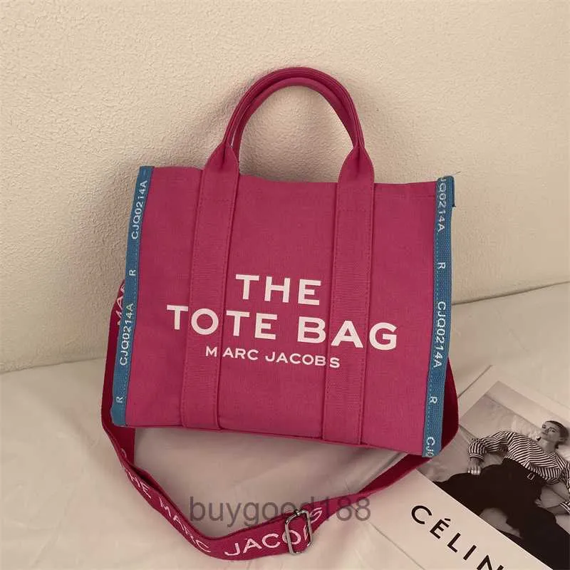 Designer Women's Mc Tote bag womens large capacity 2024 spring summer minimalist letter commuting crossbody niche design