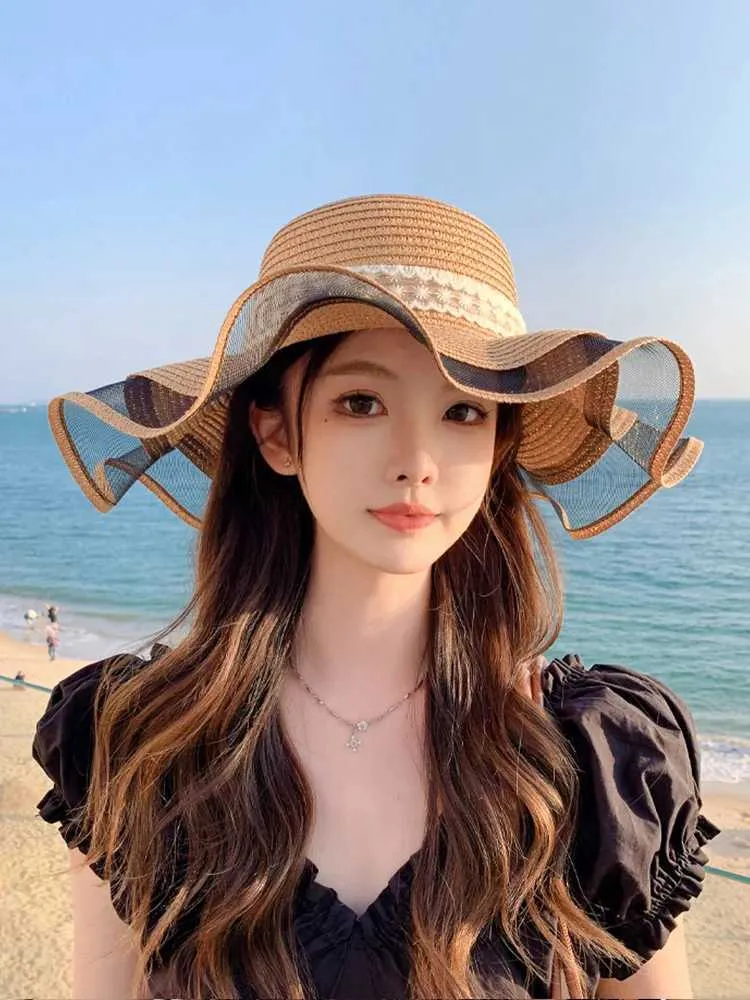 Breda randen hattar hink hattar sommar kvinnors hatt med veckad båge och andningsbar strat hav vid havet turism strandhatt j240425