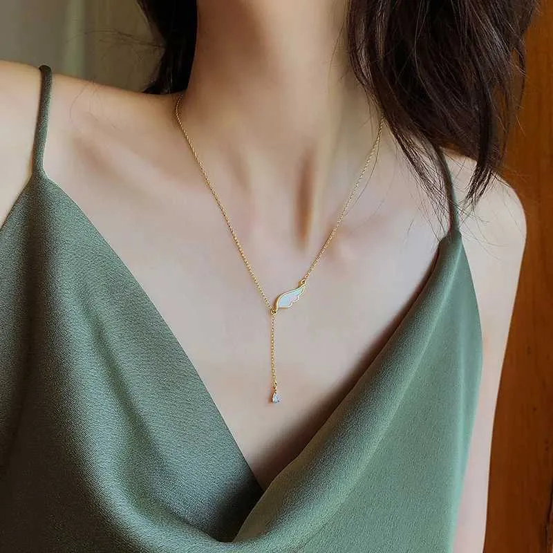 Collane con ciondolo alla moda con conchiglia bianca e ali d'angelo Collana leggera Personalità classica Nicchia Ins Stile semplice_voghion.com