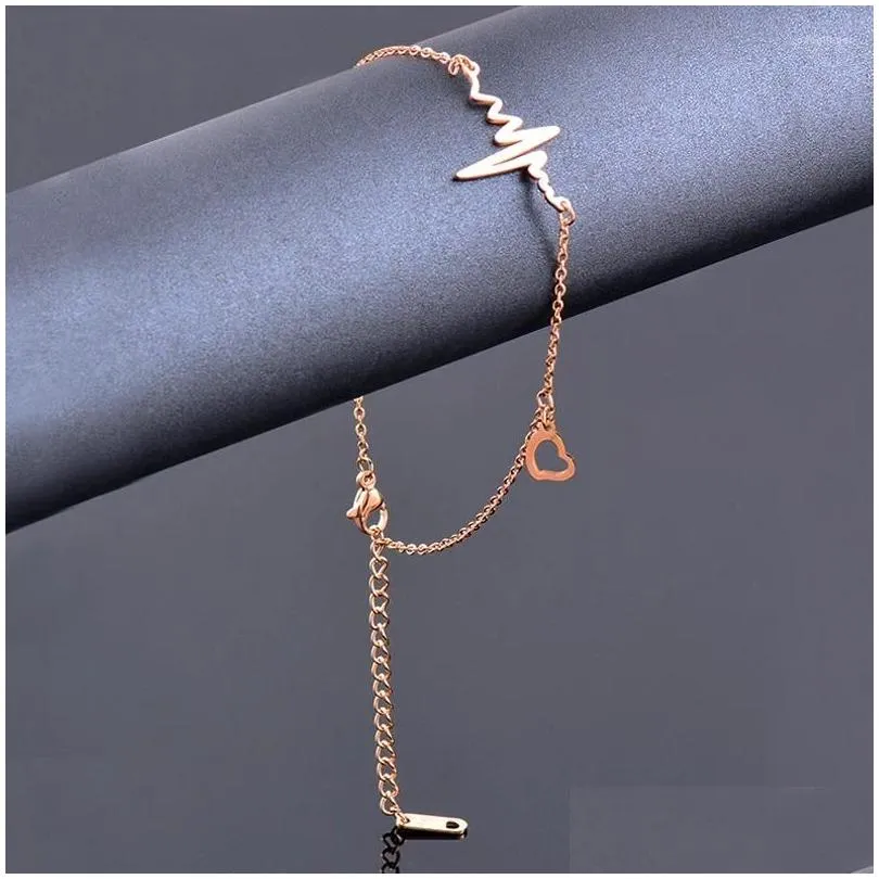 Enkelbanden Leeker roestvrij staal voor vrouwen Black Hart Bloem Bells Rose Gold Color Beach Juwelier Party Accessoires 012 LK2 Drop Lever Otjxh