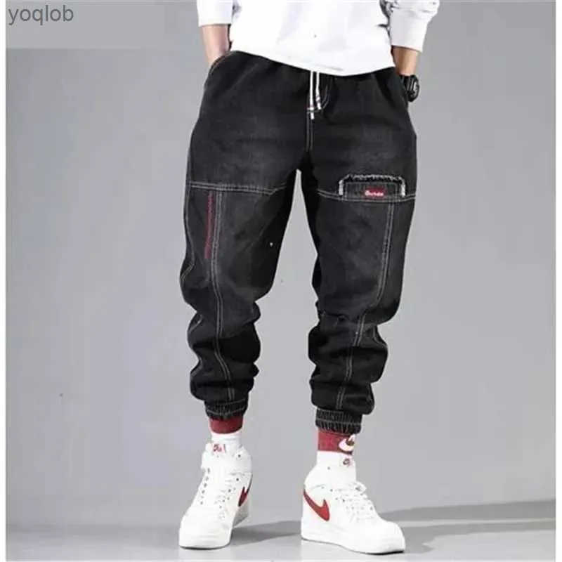 Herenjeans Koreaanse mode enkelband denim heren jeans zwart grijze vrachtheren elastische pocket harem broek straat kleding hiphop jeansl2404L2403