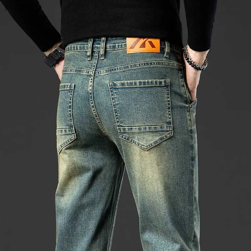 Jeans masculin rétro pour hommes étirent les jeans droits à la mode lavage de poche serrée denim pantalon de marque classique avec toute la longueur pour Menl2404