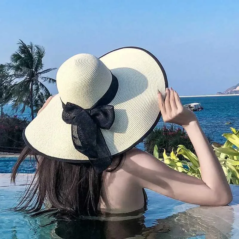 Cappelli larghi cappelli a secchio Big Bowkno Summer Fashion Hat Beach Flat Panama La Casual Brim Str Hat Beach C Black Bow Womens Accessori J240425