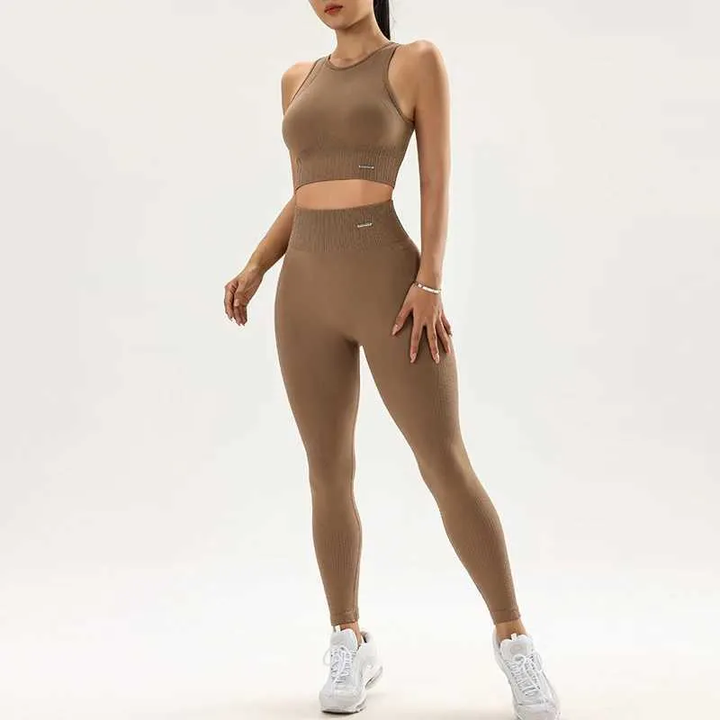 Ju6i Women's Tracksuits Yoga Costume Set pour les femmes avec des jambes à taille haute et un costume d'entraînement de fitness sans couture en deux pièces 240424