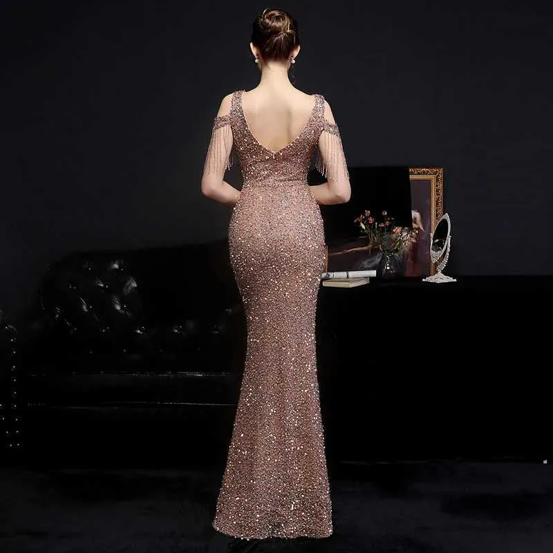 green emerald velvet dress Rose Gold Sequin Long Sleeve Wrap Front Midi Dress main image 0