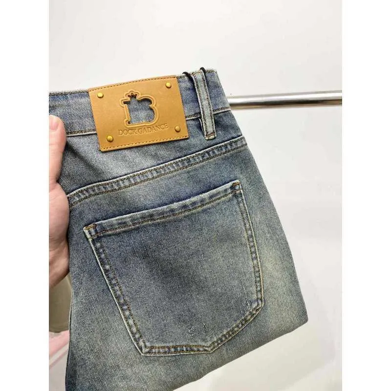 Jeans boutique mens tvättade katt whisker färg liten rak ben elastiska långa byxor våren stora märke europeiska varor