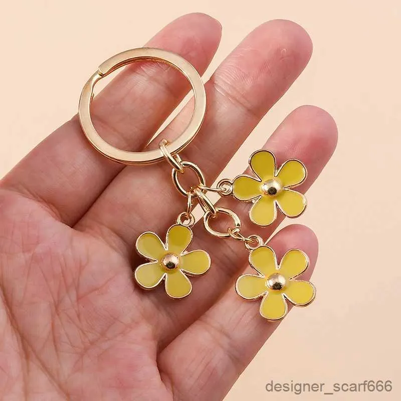 Schlüsselanhänger Lanyards süße farbenfrohe Blütenschlüsselketten Emaille Blume Charms Schlüsselring Frauen Männer Auto Bag Anhänger Schlüsselketten DIY -Schmuckzubehör Accessoires