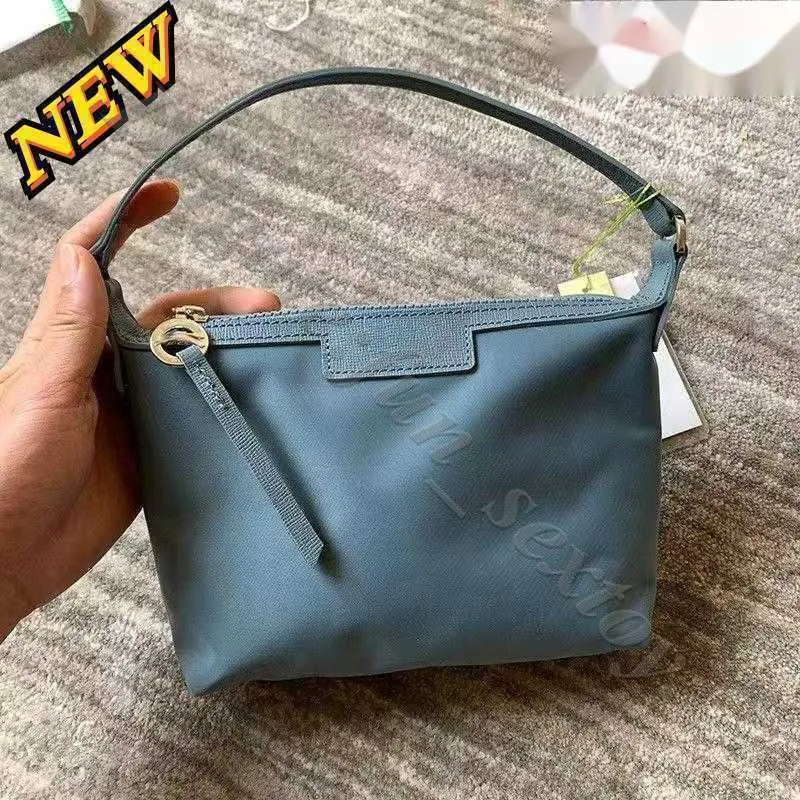 2024 Clai de sac à main venant 95% de réduction sur le portefeuille en gros de Lingyang Sac Femmes Fashion simple Bolsos Bolsos Sac Small Small Nylon Imperproof Handbag Mnbv