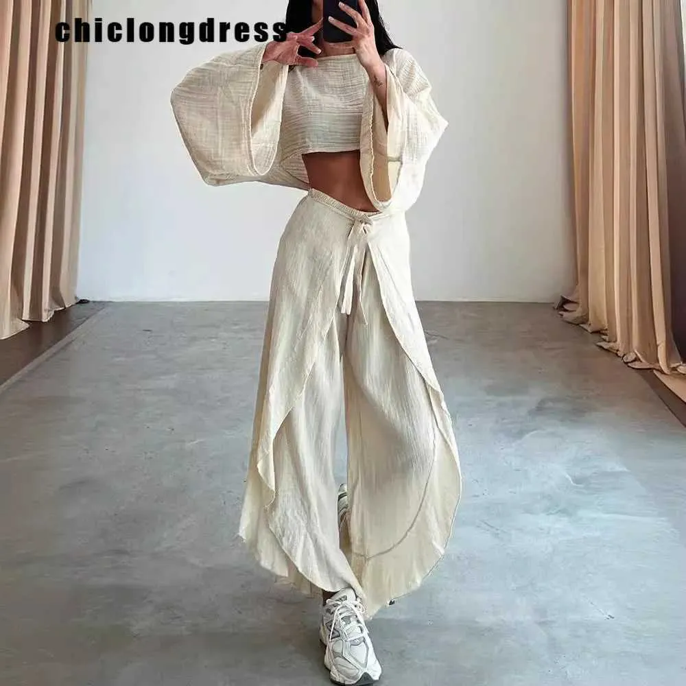 Kvinnors tvåbitar byxor Sommarmode Vacation Style Tvåverk Set Women Casual Solid Flare Slve Top Split Wide Leg Pants Two Piece Set Women Y240426