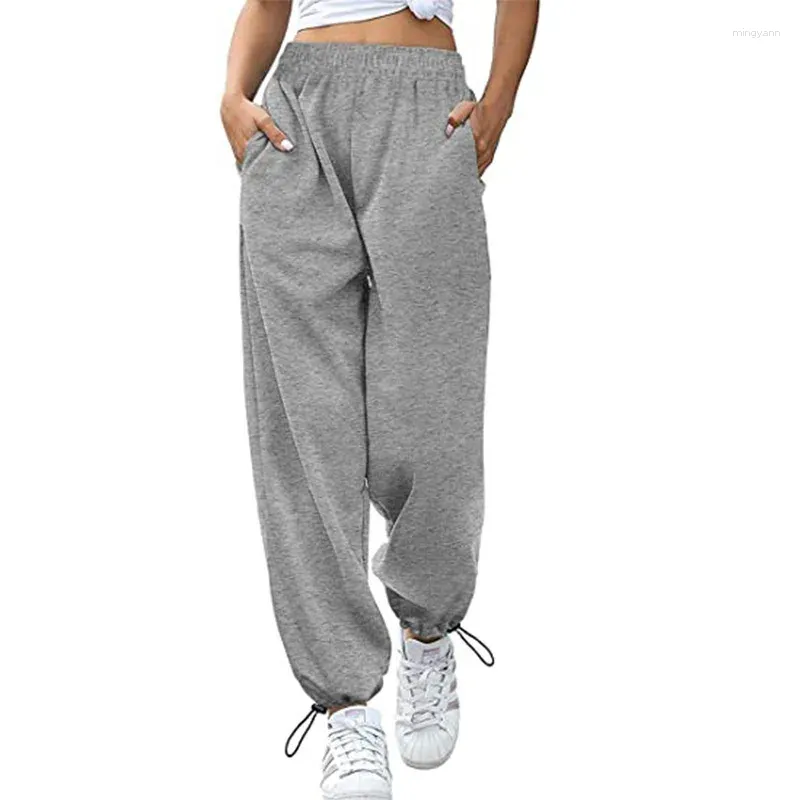 Pantalon féminin 2024 Printemps d'été Femmes larges Ligne solide poche décontractée en vrac noir gris dames pantalons de mode Sport de street