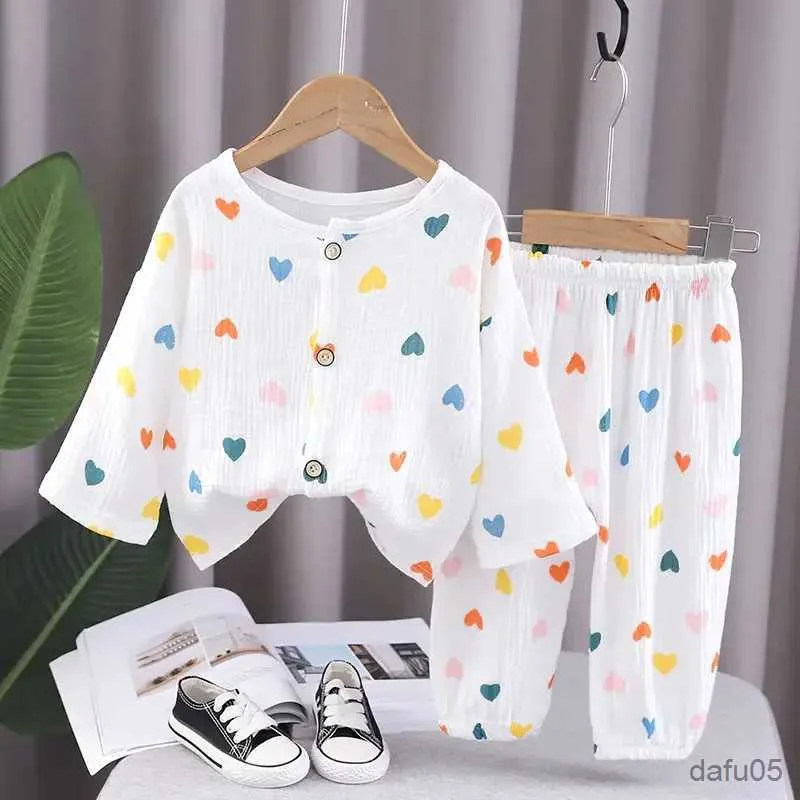 Vêtements Ensembles Kids Boys Girls Cartoon Imprimé Sorcs à manches courtes Shirts Short Sleeping Shorts pour tout-petits Pyjama Sets 2pcs Enfants Costumes décontractés