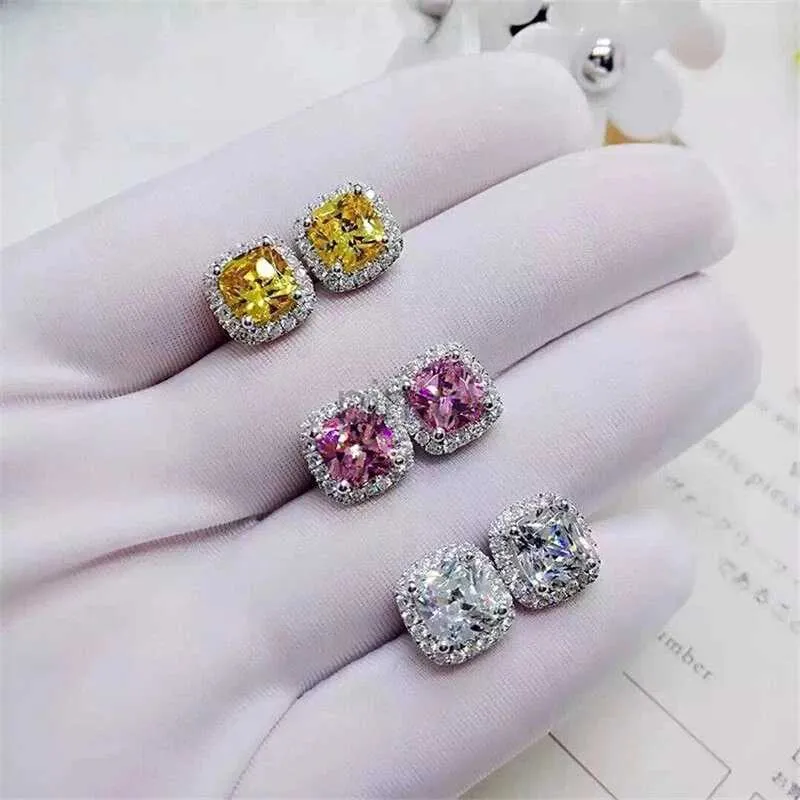 Stud Huitan Bright White / Jaune / Rose CZ Boucles d'oreilles Stud For Women Mode Contracted Bijouts de haute qualité Moucles d'oreilles de fiançailles de mariage D240426