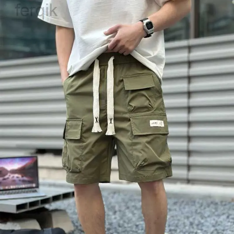 Heren shorts 2024 Zomer Amerikaanse gereedschapshorts Heren Mens Multi-Pocket Quick Drying Shorts Ademende rechte vijfpunts broek Streetwear D240426